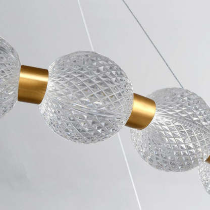Acrylic Globe Pendant Lighting with Gold Fixtures
