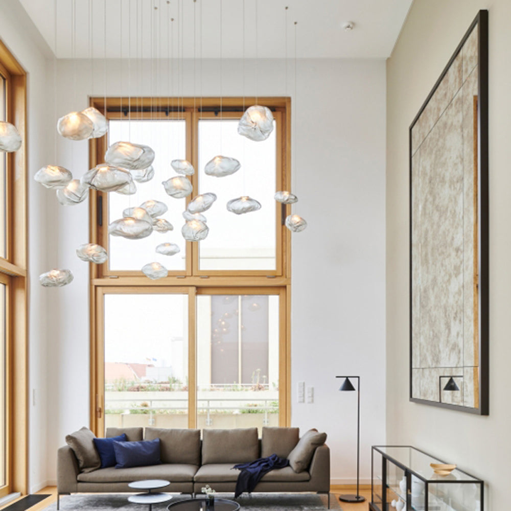 Byers glass pendant light cluster over living room sofa.