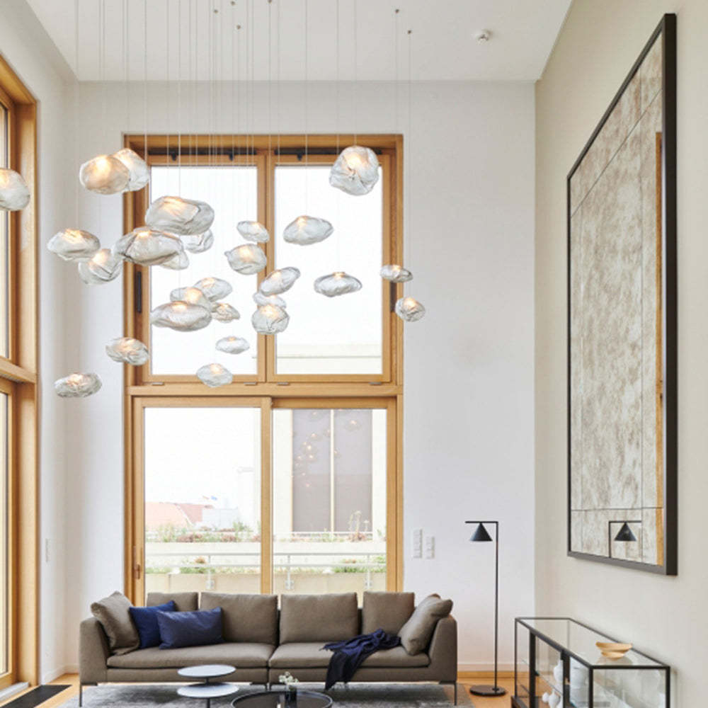 Byers glass pendant light cluster over living room sofa.