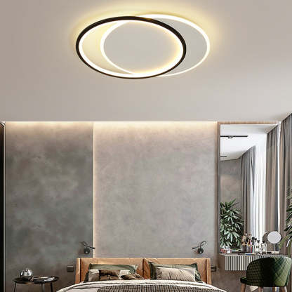 Modern Quinn round ceiling light in bedroom setting