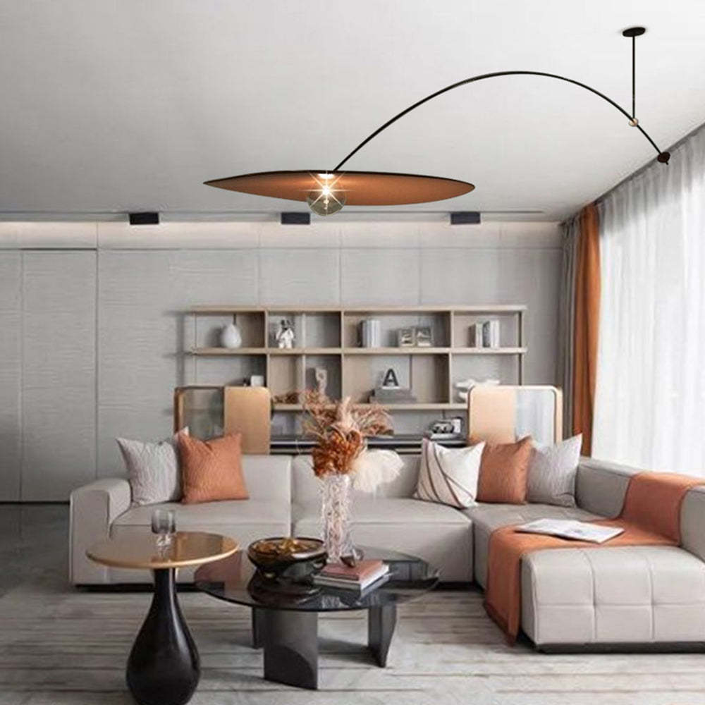 Cairns leaf pendant light in living room setting.