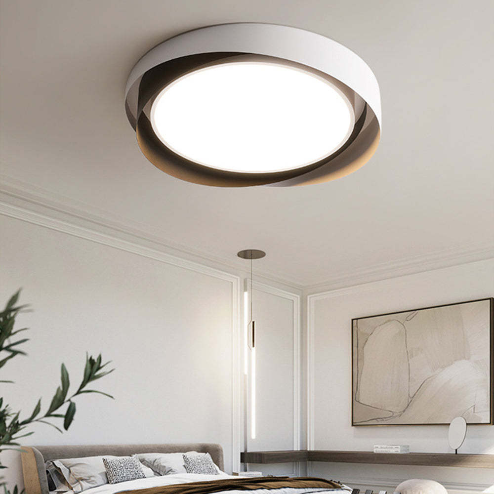 Quinn Ceiling Light illuminating a modern bedroom
