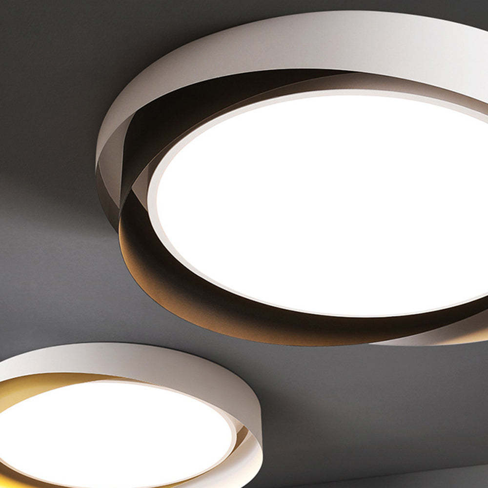 Quinn flush mount ceiling light, detail of white and gold design.