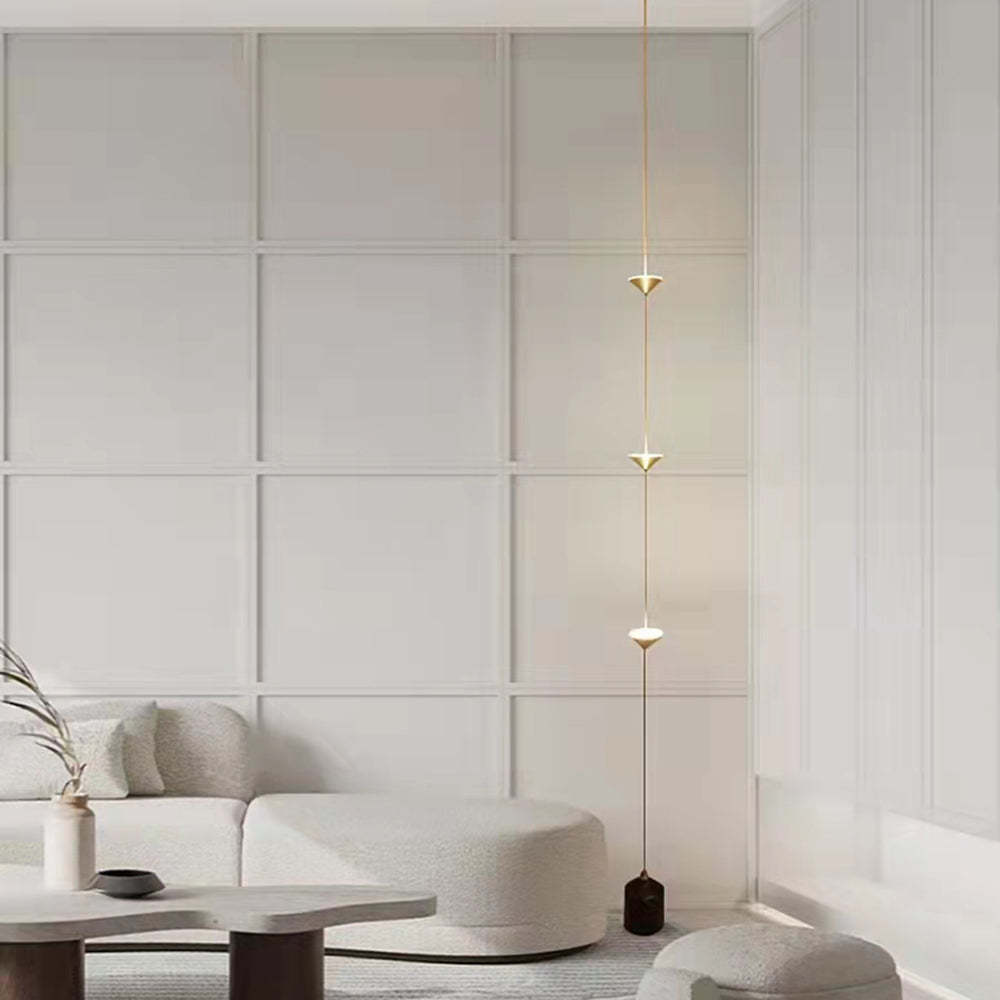 Minimalist LED floor lamp in a living room setting