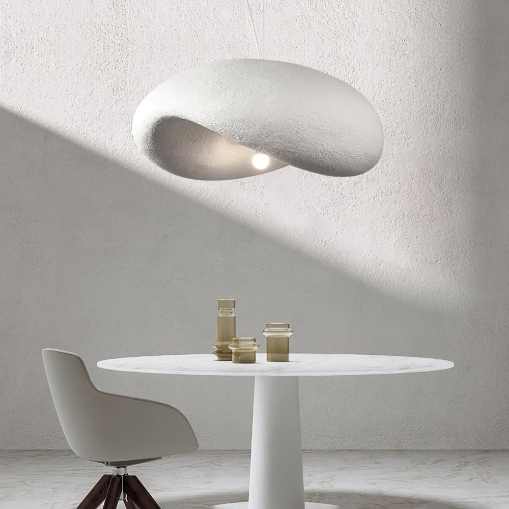 Byers cloud pendant light over modern dining table.