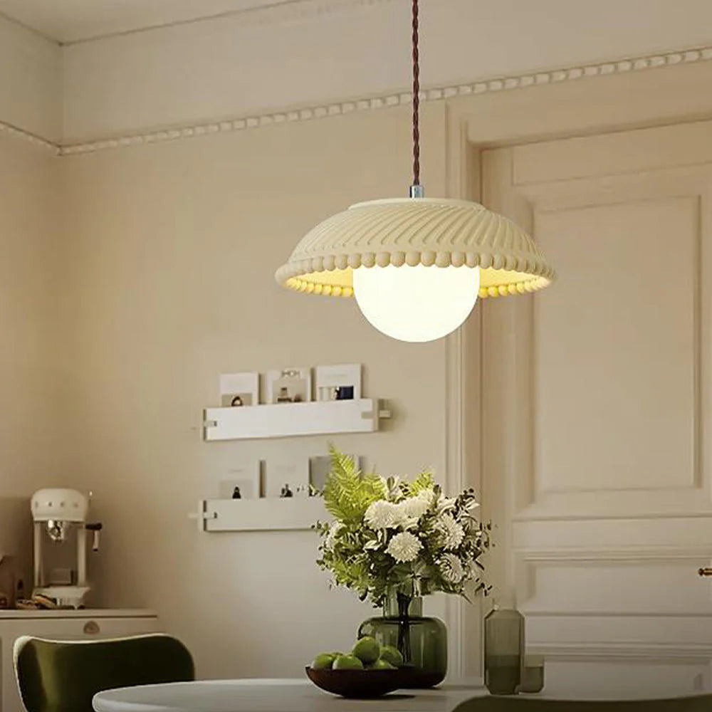 Elif Pendant Light illuminating dining room