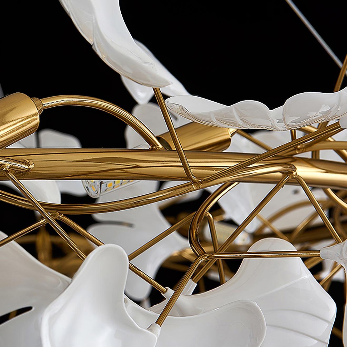 Olivia EarthenGlo Chandelier detail: gold frame, white leaves