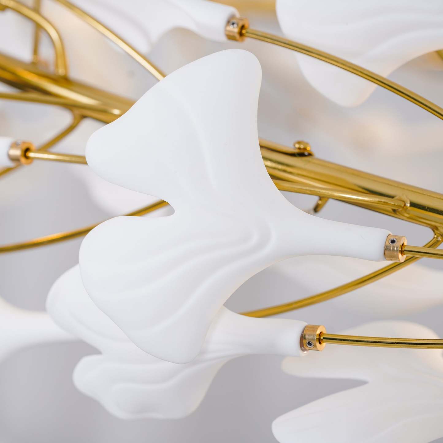 Olivia GinkLuxe Chandelier close-up, white ceramic leaf details