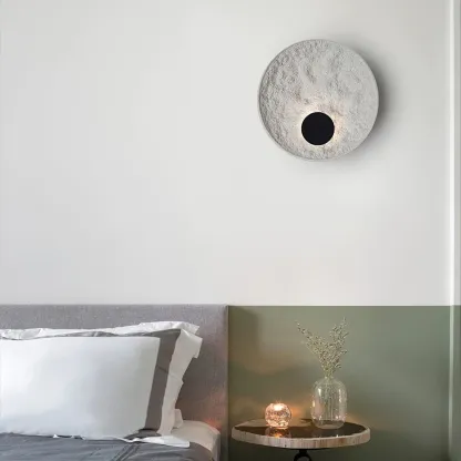 Byers modern LED resin wall lamp in a bedroom setting