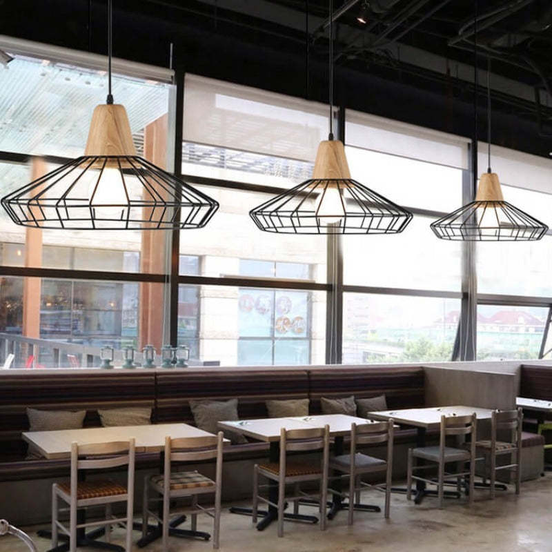 Alessio industrial pendant light in a cafe setting.