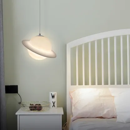 Hailie Jupiter Pendant Light in bedroom with white bed