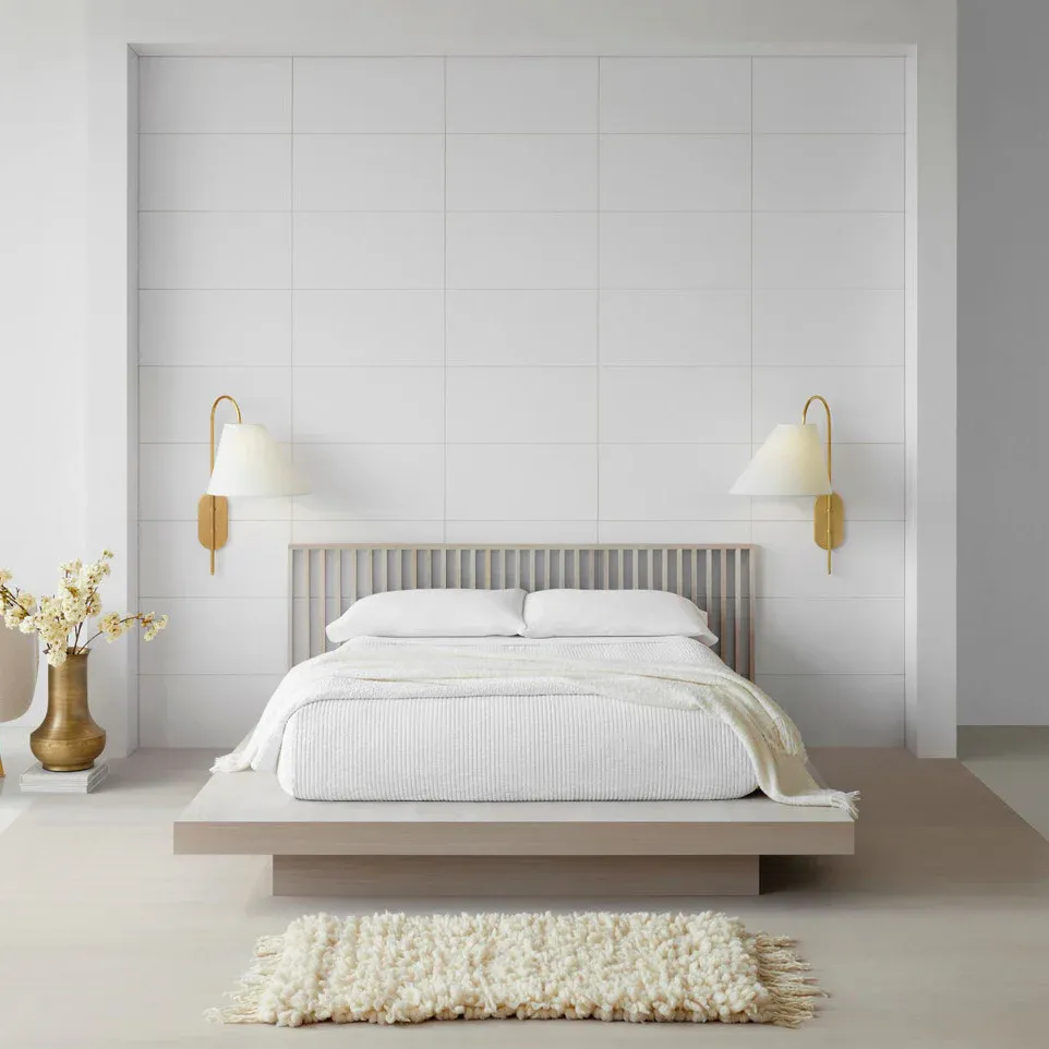 Bedroom interior with Carins wall lamps, modern lighting design