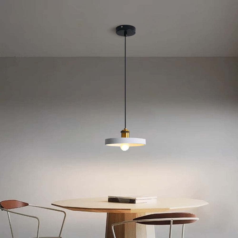 White Morandi pendant light over dining table