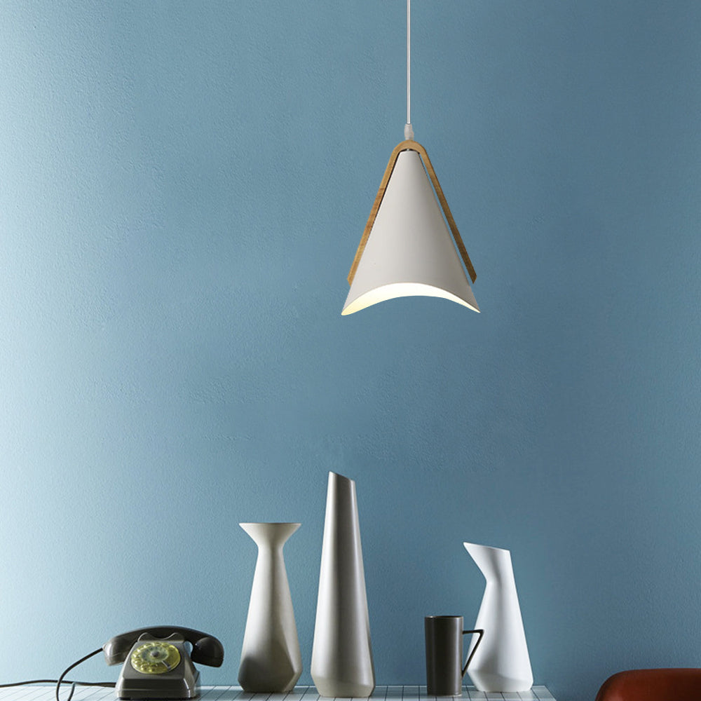 White Morandi cone pendant light over vases. Modern lighting.