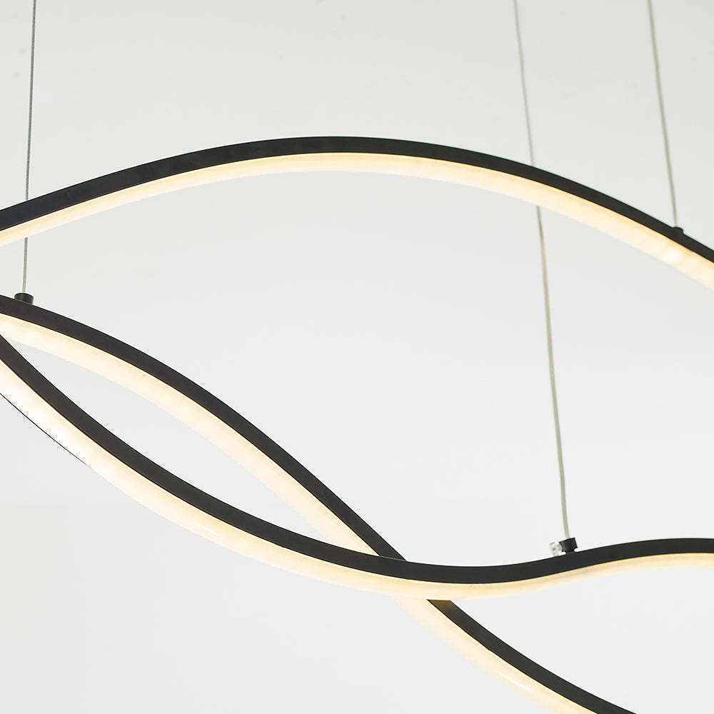 Louise Pendant Light: Modern curved metal LED fixture.