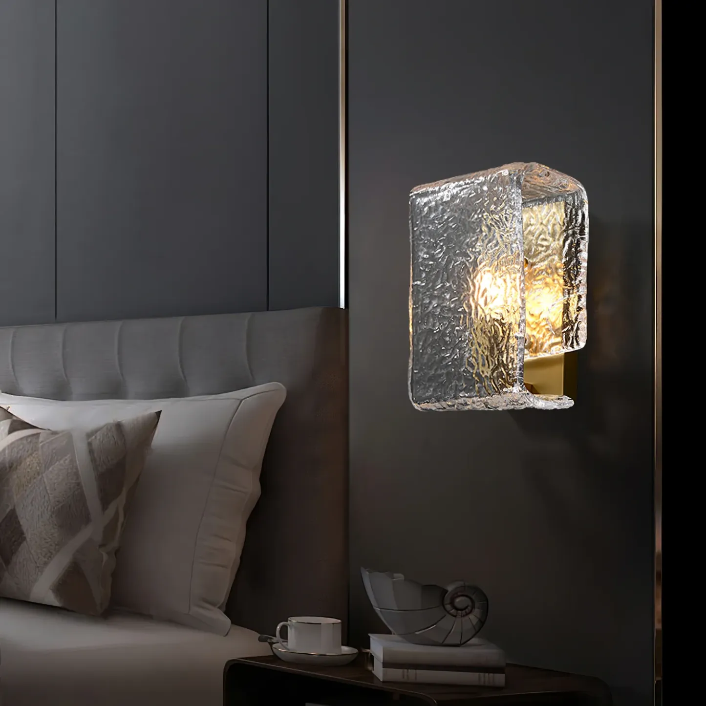 Kristy Modern Wall Lamp illuminating bedroom with textured glass