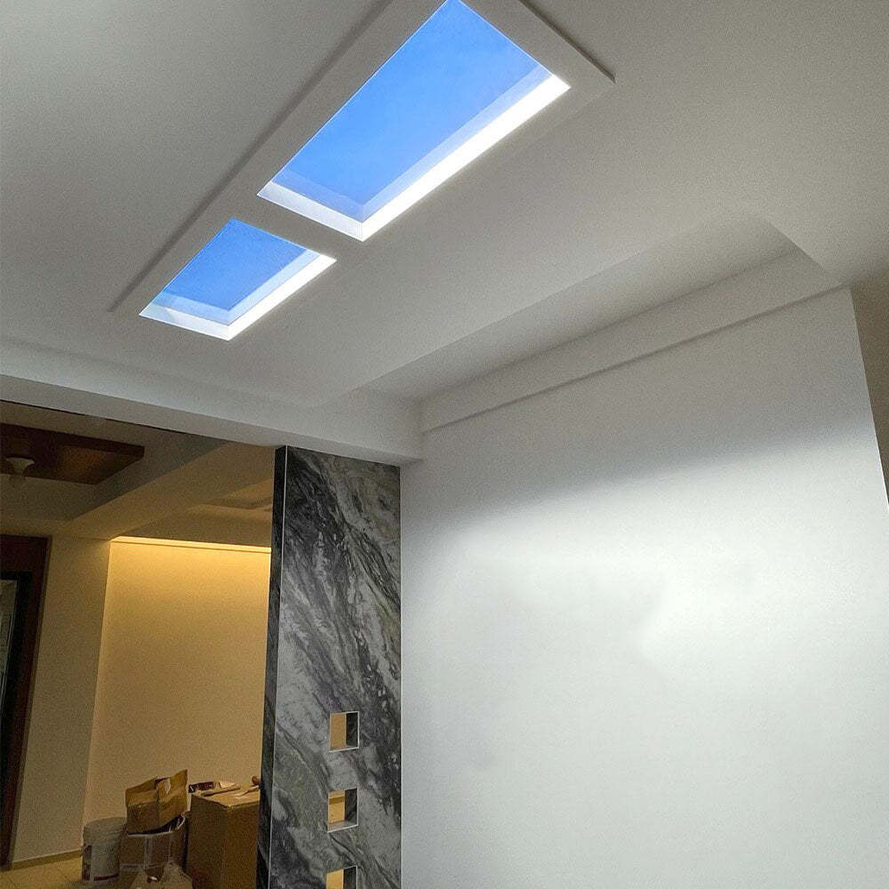 Modern blue ceiling light, flush mount LED in home interior.