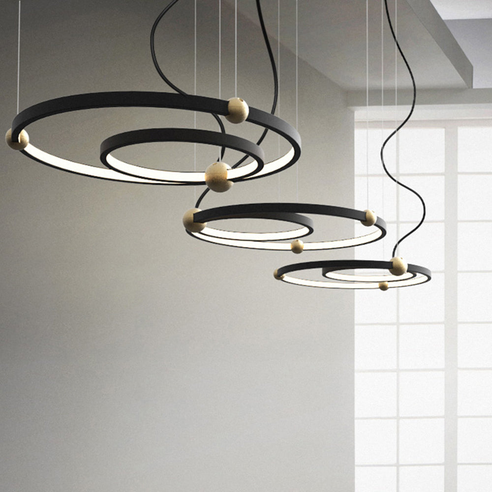Arisha Ring Pendant Light: Modern minimalist black and gold lighting.
