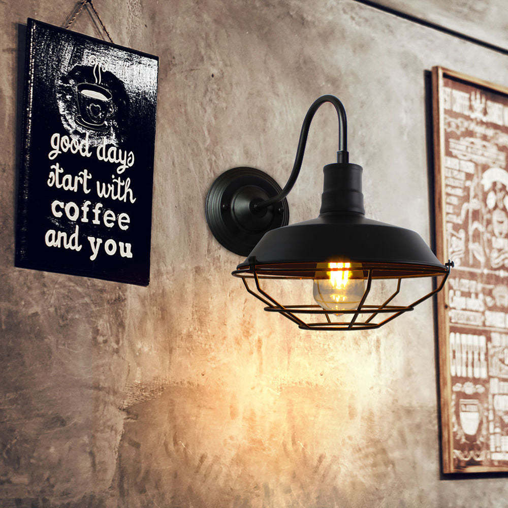 Alessio black metal wall lamp with vintage bulb.