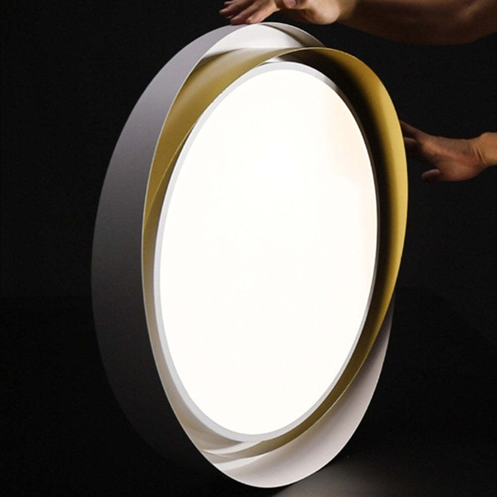 Quinn flush mount ceiling light, detail of gold and white design.