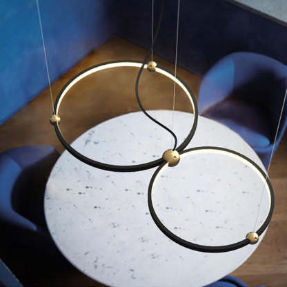 Arisha ring pendant light over dining table, minimalist design
