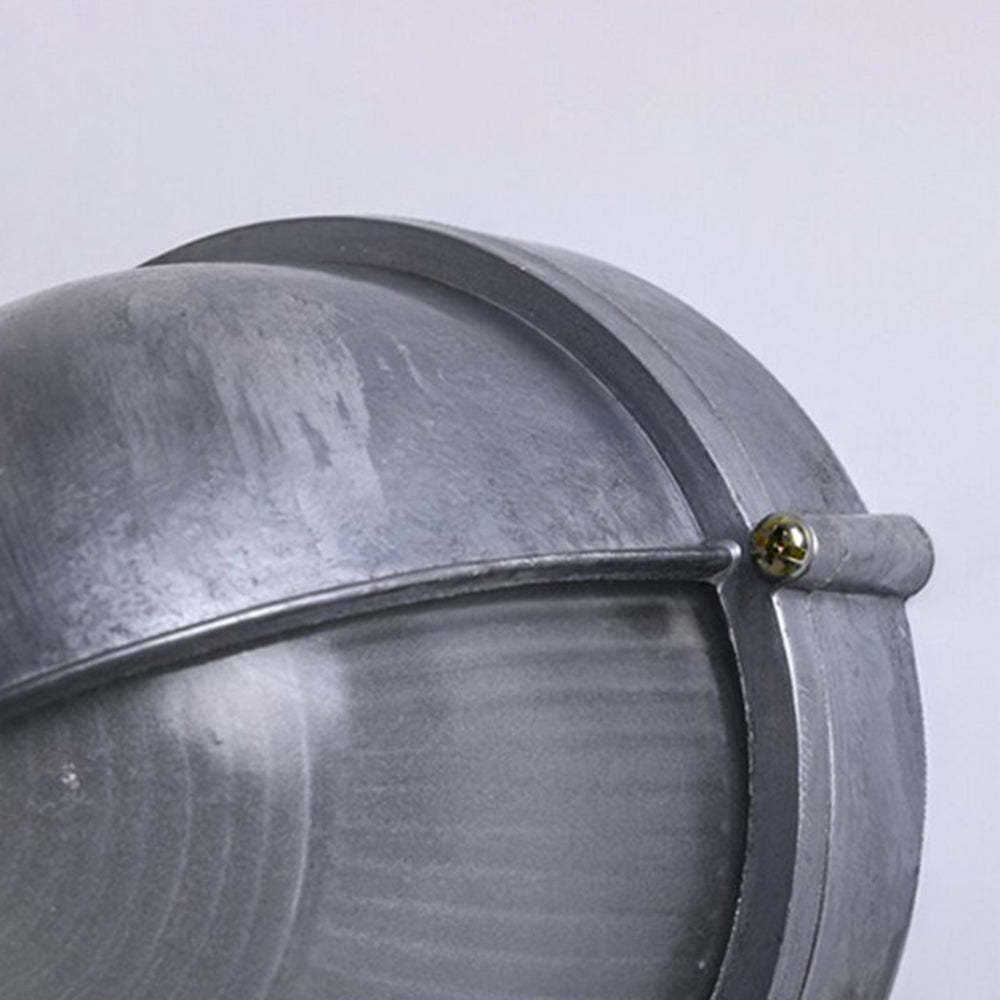 Close-up detail of Orr Modern Ellipse Outdoor Wall Lamp metal shade