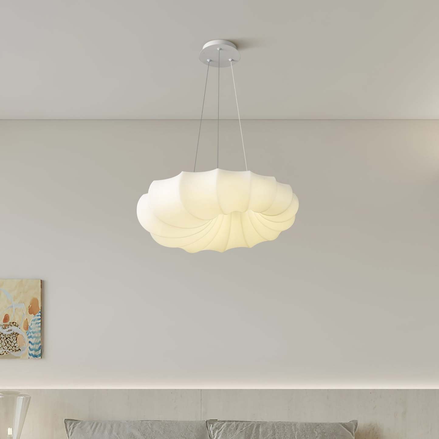 Modern cloud pendant light in a bedroom setting