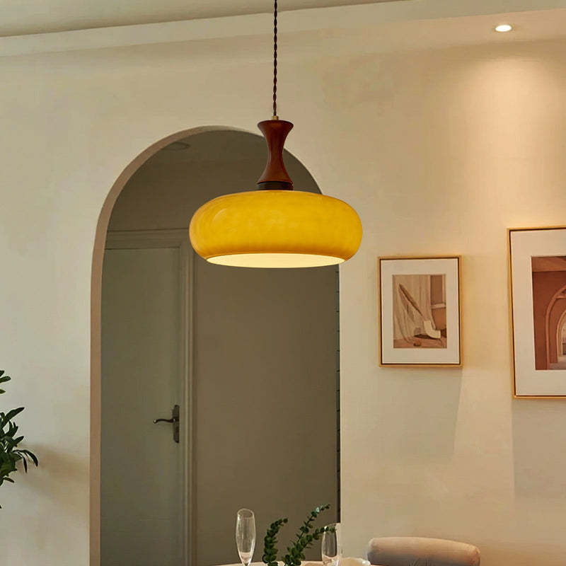 Yellow glass pendant light in living room, Cairns vintage design