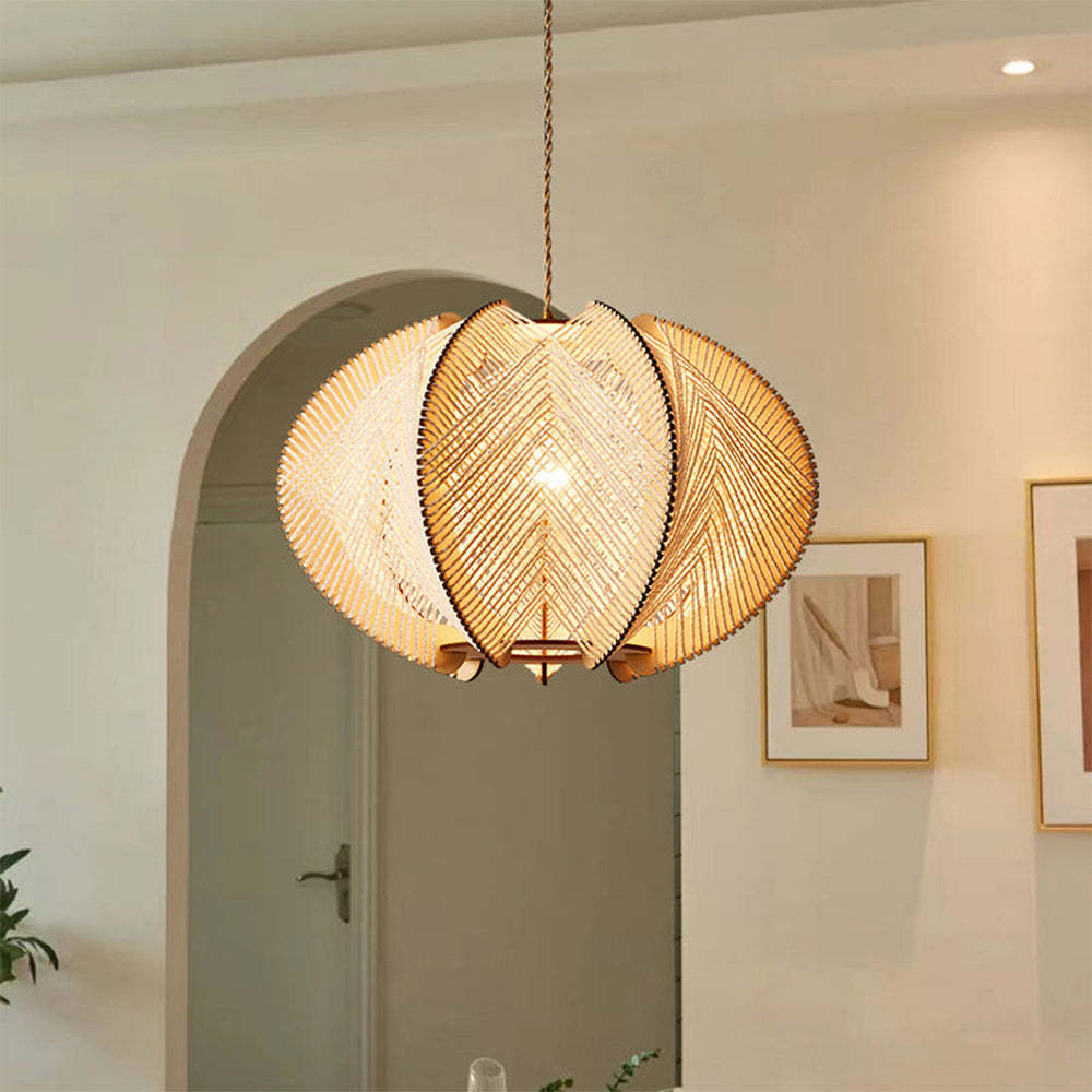 Muto Retro Round LED Pendant Light illuminating a dining room