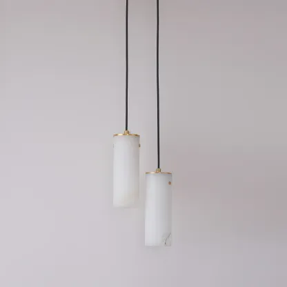 Ozawa modern pendant light fixture, white stone cylinders with gold accents, minimalist design