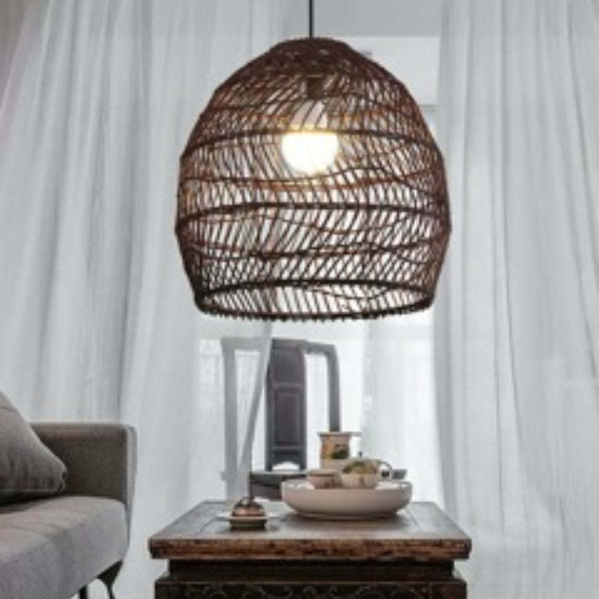 Muto rattan pendant light in a living room