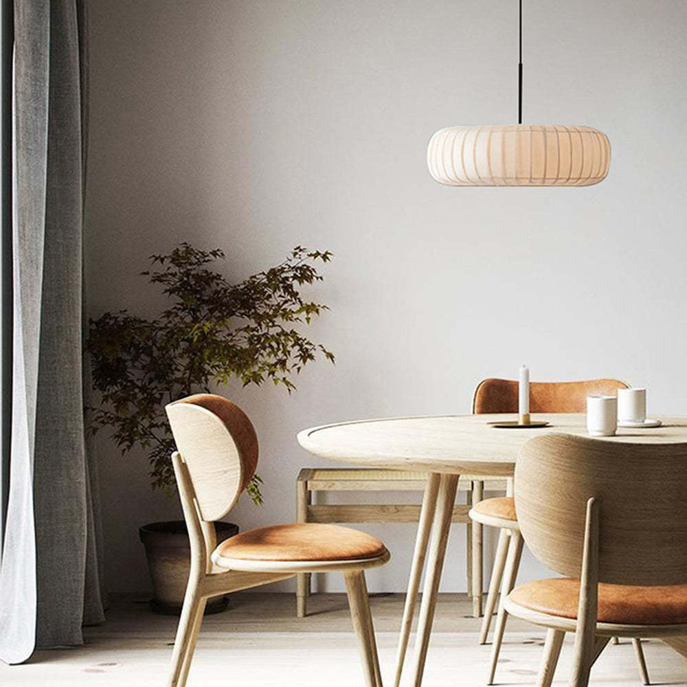 Fabric pendant light over dining table, Lassola lighting
