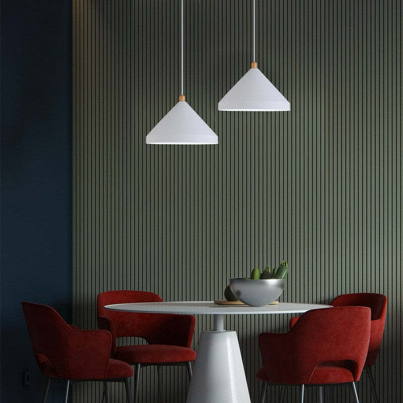 White Hailie pendant lights over dining room table