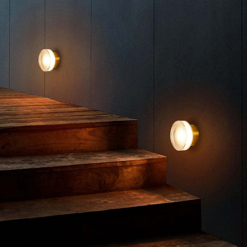 Veta Mini Bowl Wall Lamp illuminating a staircase
