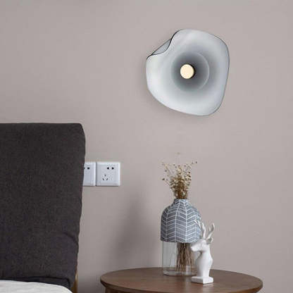 Modern Veta flower wall lamp in bedroom setting