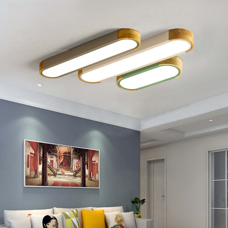 Morandi ceiling light in living room. Modern wood and acrylic fixture.