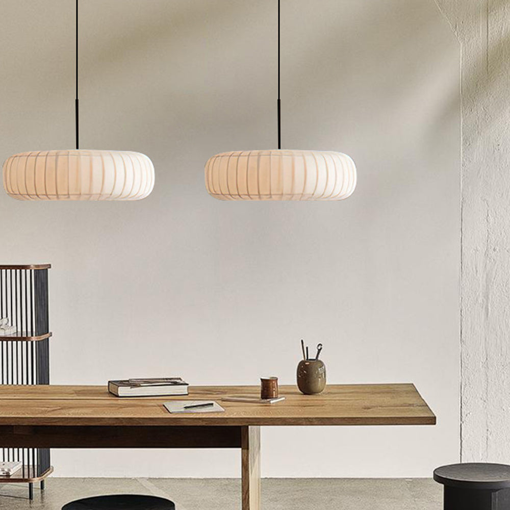 Fabric pendant lights over wooden table, living room lighting