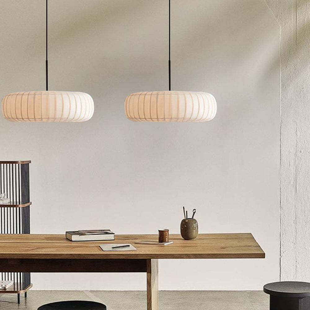 Fabric pendant lights over wooden table, living room lighting