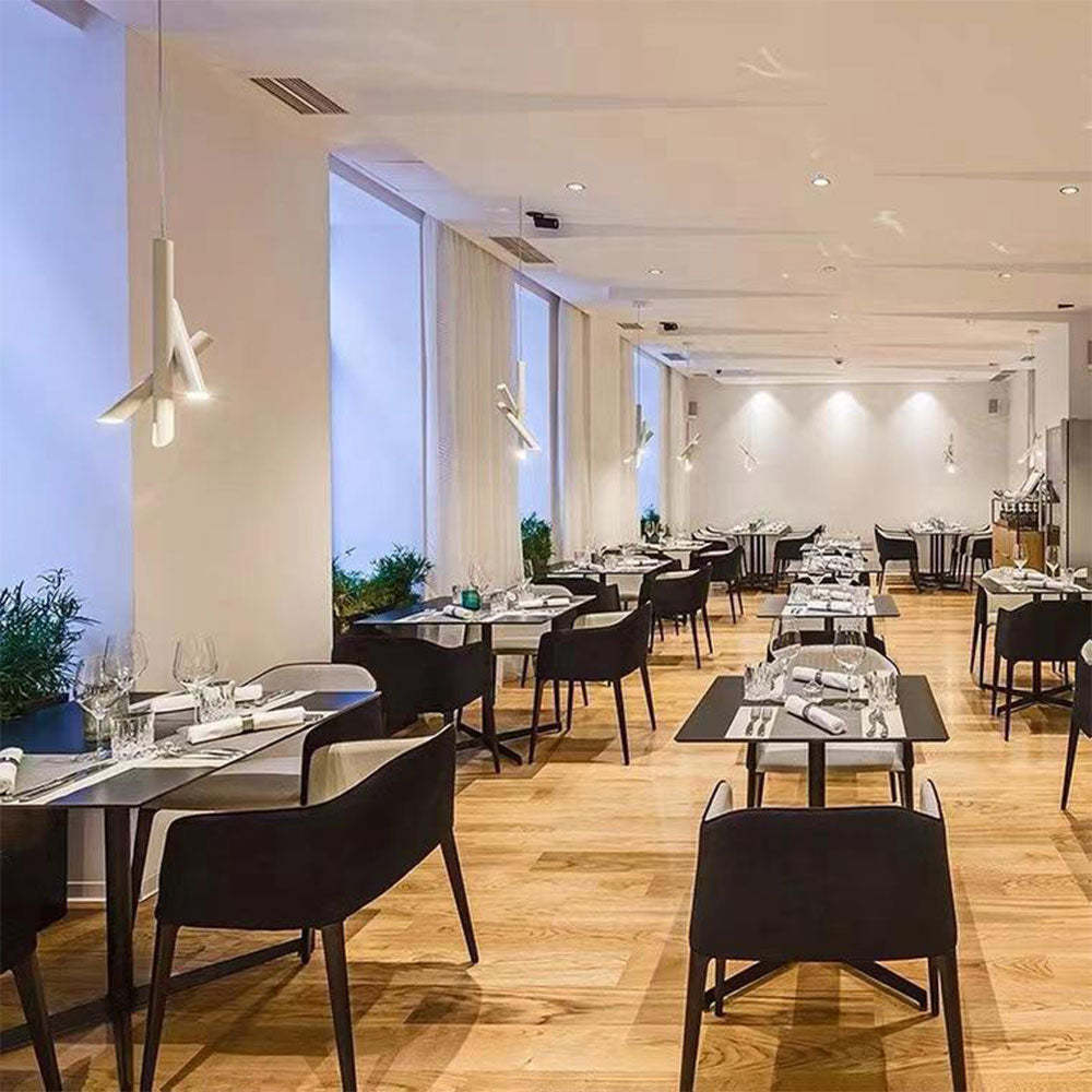 Hailie pendant lights illuminating a modern dining space
