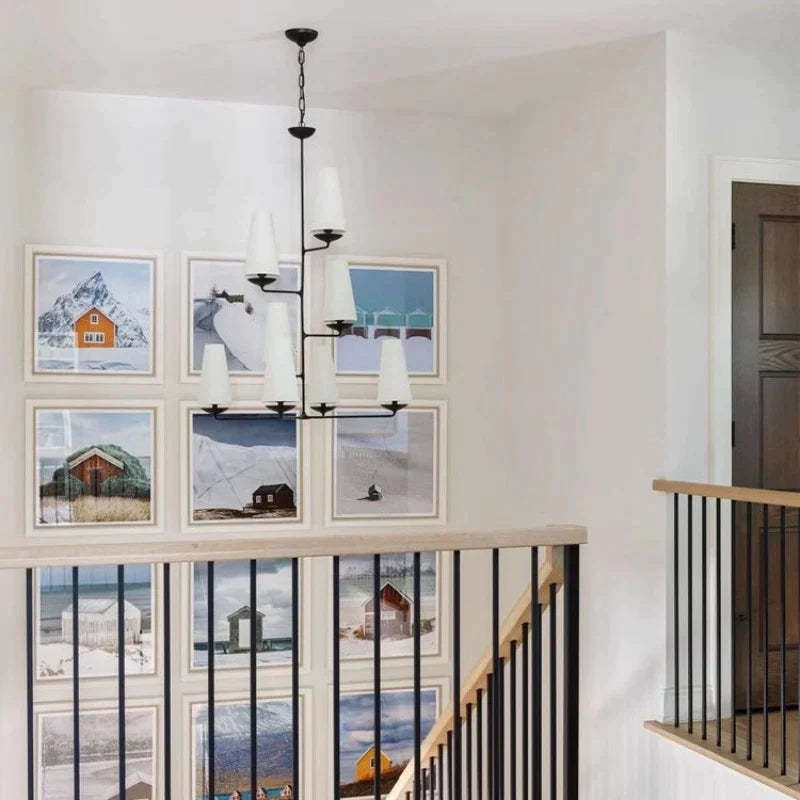 Alessio Chandelier over staircase with landscape art