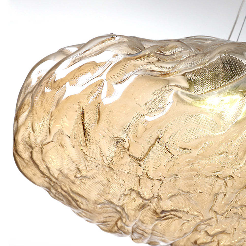 Close-up of Nielsen amber glass pendant light, perfect for dining room