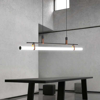 Edge linear pendant light above modern dining table by Las Sola