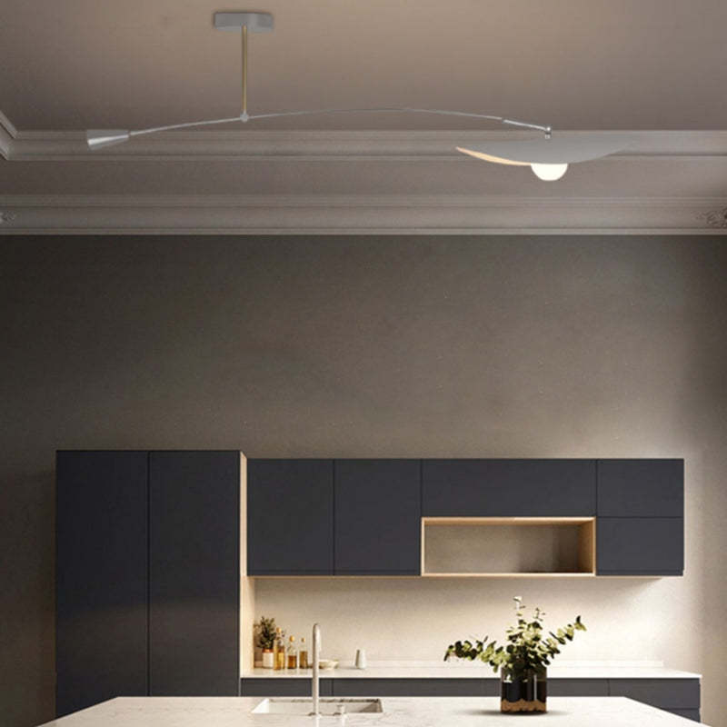 Cairns LED pendant light in modern kitchen setting.