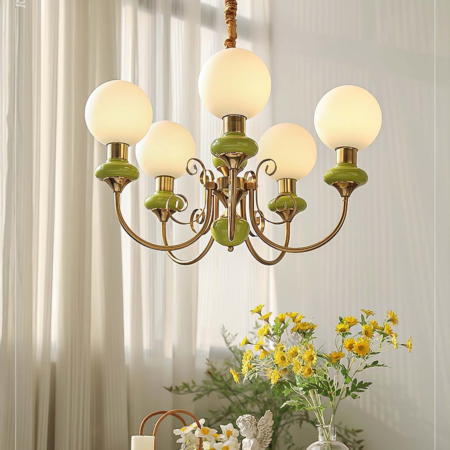 Modern chandelier with green accents in dining room