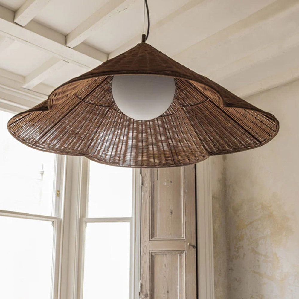 Muto Rattan Pendant Light hanging indoors, bedroom lighting