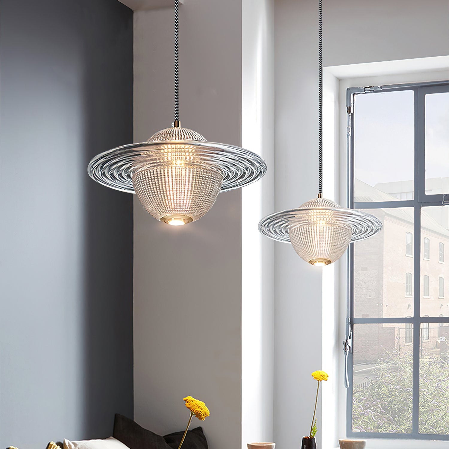 Modern glass pendant lights in a living room setting