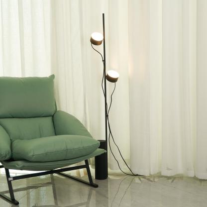 Las Sola Avi Floor Lamp with green accent chair.