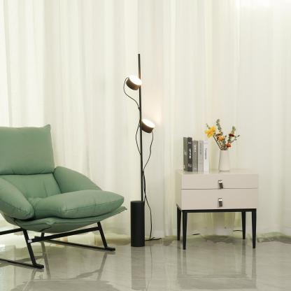 Avi Floor Lamp in modern bedroom setting.