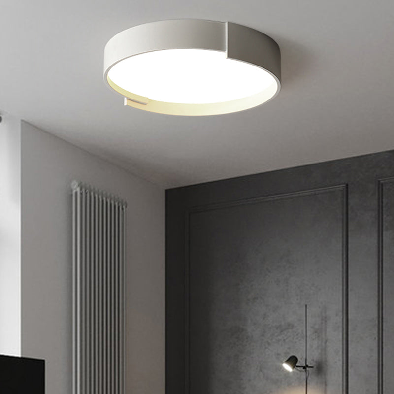 Quinn Modern Round Flush Mount Ceiling Light, illuminating room.