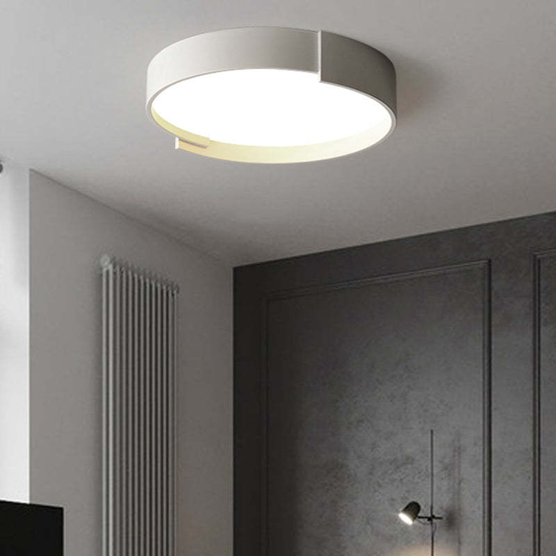 Quinn Modern Round Flush Mount Ceiling Light, illuminating room.
